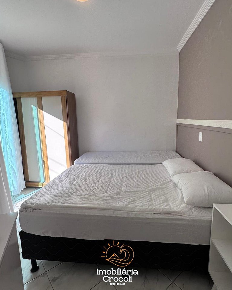 Apartamento beira-mar com piscina
