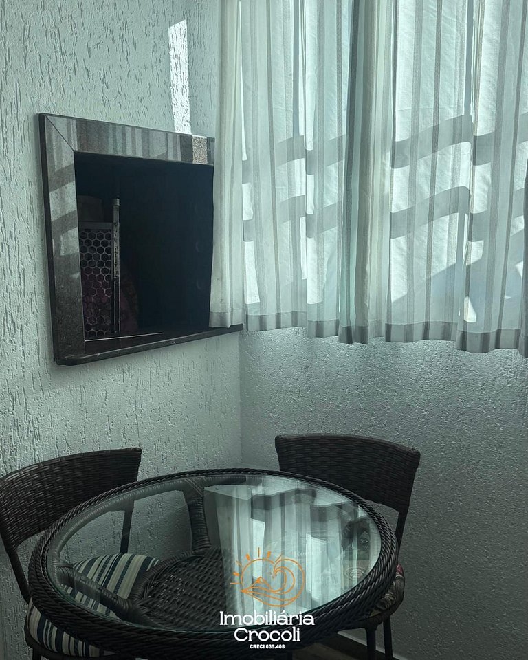 Apartamento beira-mar com piscina